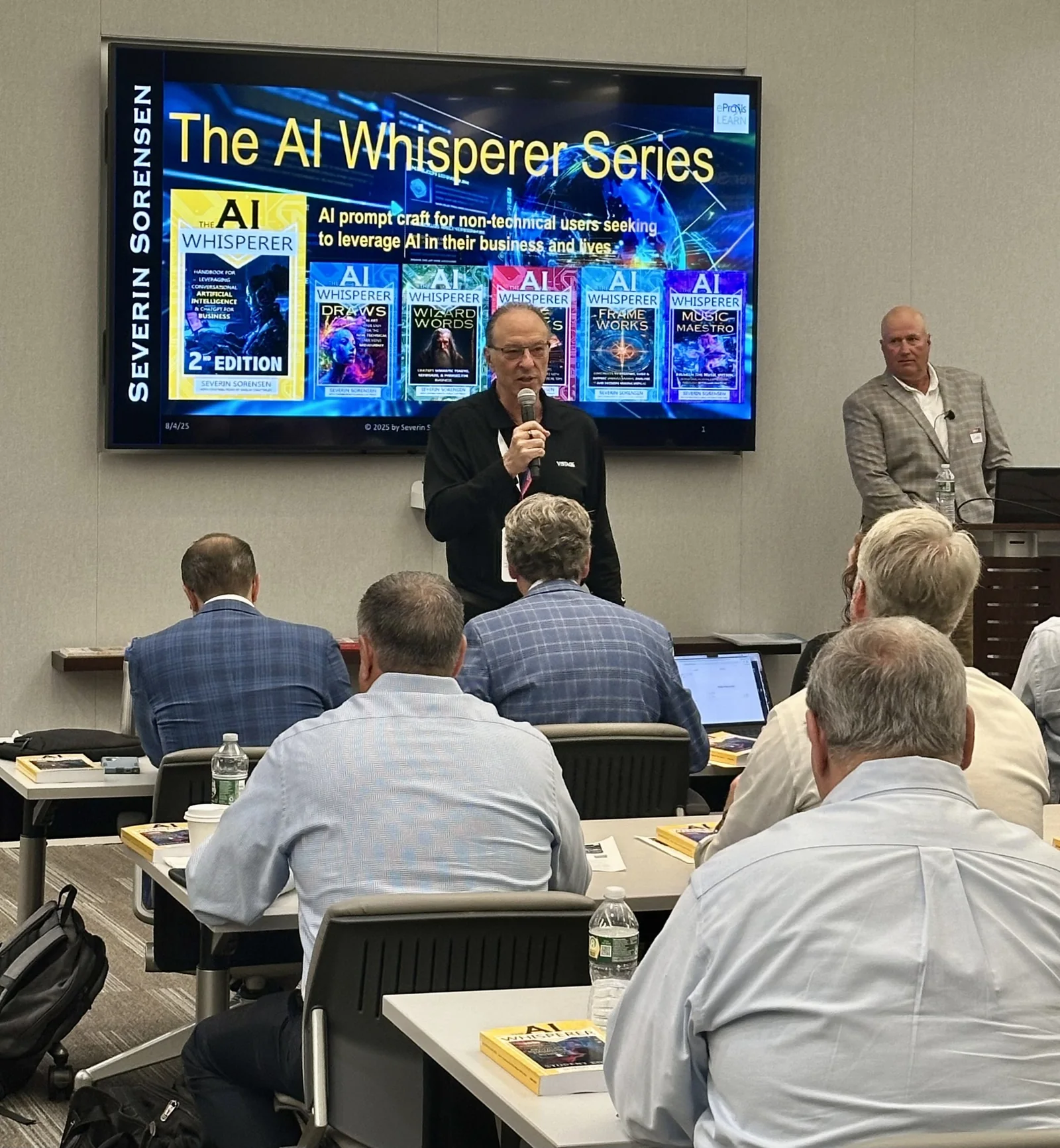 Mark Taylor and Severin Sorensen with an executive audience